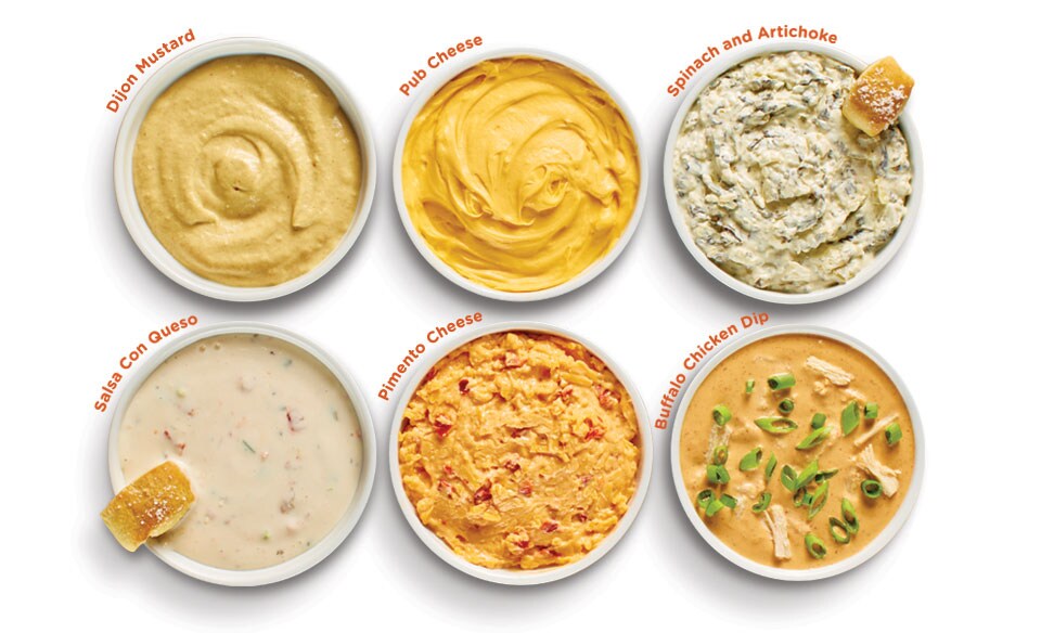6 different bowls of pretzel dip
