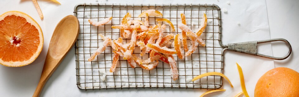 candied grapefruit peels on wire rack