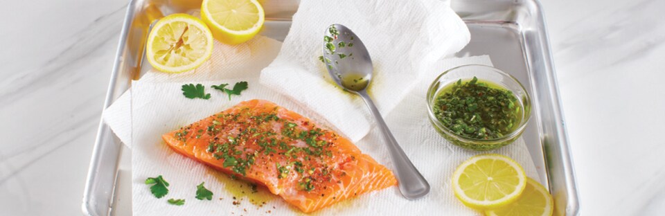 Prepping salmon for grilling