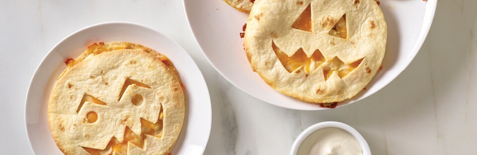 Jack-O-Lantern Quesadillas on a plate