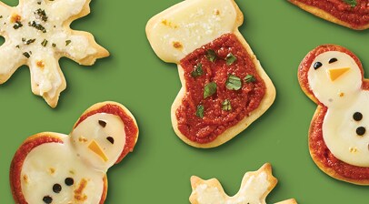miniature pizzas shaped like christmas cookies