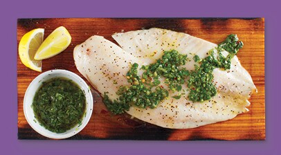 cedar plank with a seasoned fish filet
