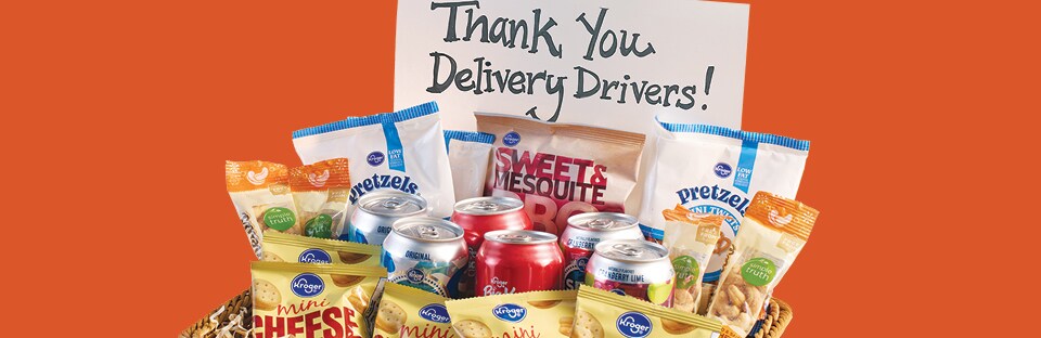 basket of snacks and drinks with a sign that says “Thank You Delivery Drivers”
