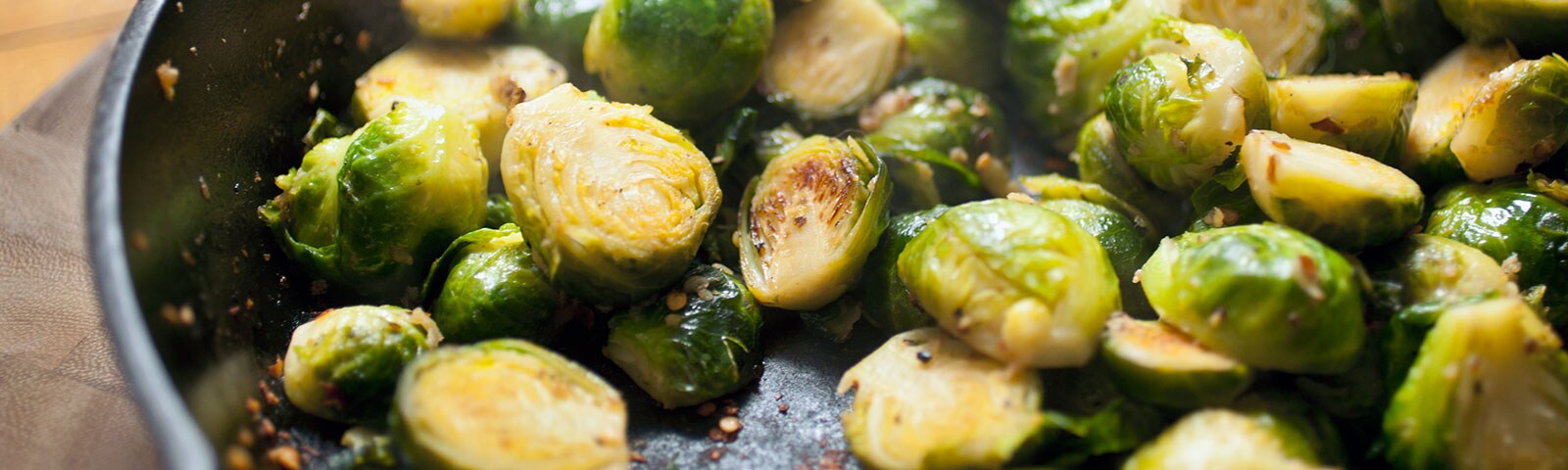 Brussel sprouts cooking in a cast iron pan Brussel sprouts cooking in a cast iron pan