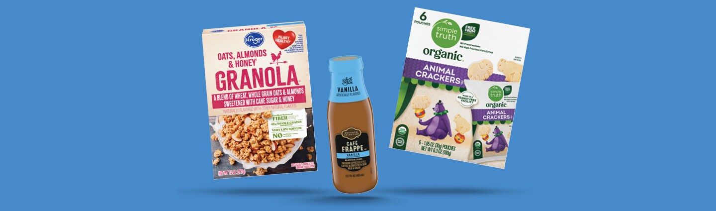 Granola package, cafe frappe bottle and organic animal crackers package on blue background