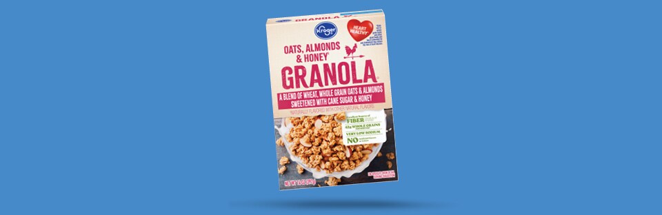 Ornaments: Oats, Almonds and Honey granola package on blue background