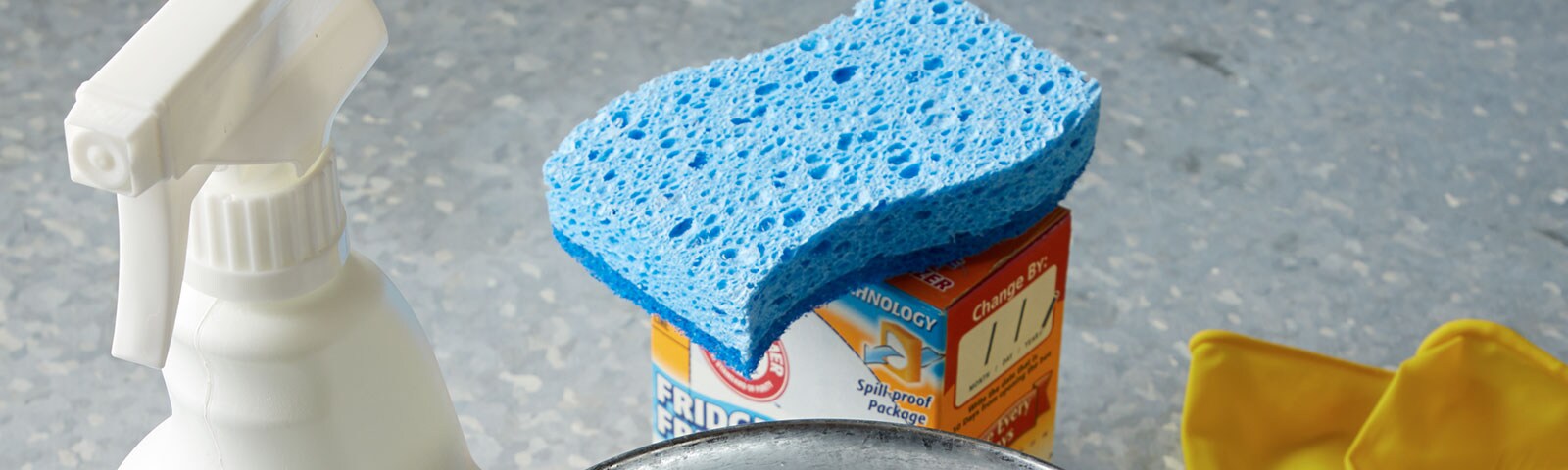 Cleaning supplies with blue sponge Cleaning supplies with blue sponge