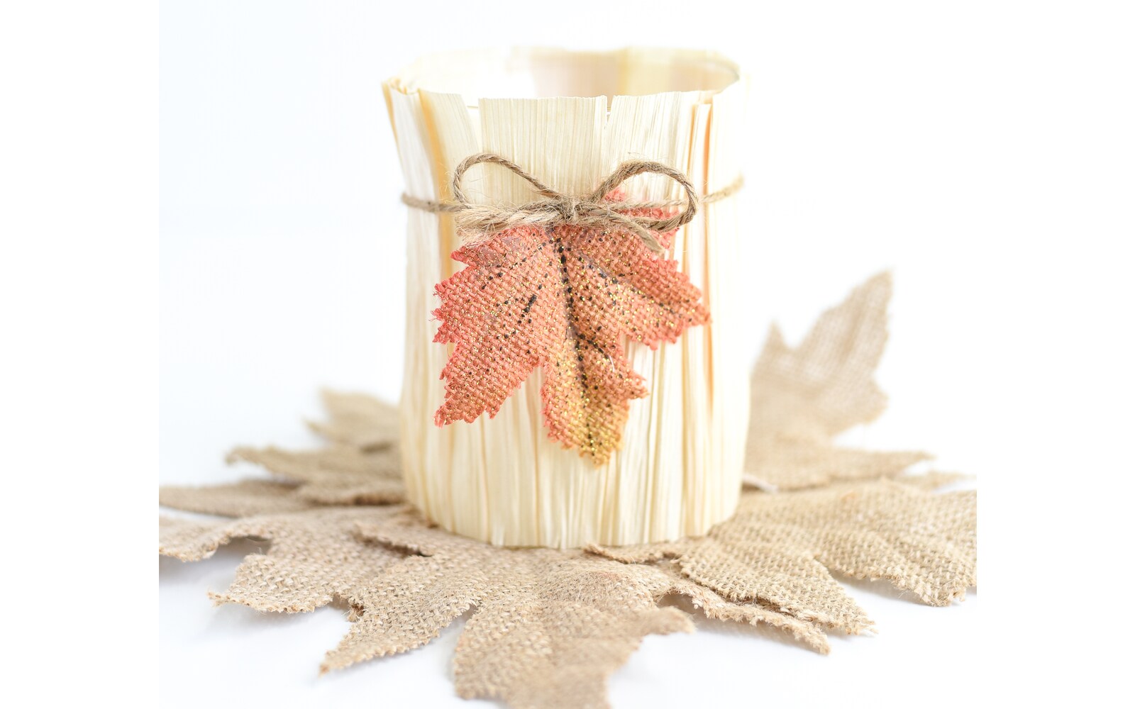 DIY vase made using a cornhusk and faux leaves DIY vase made using a cornhusk and faux leaves