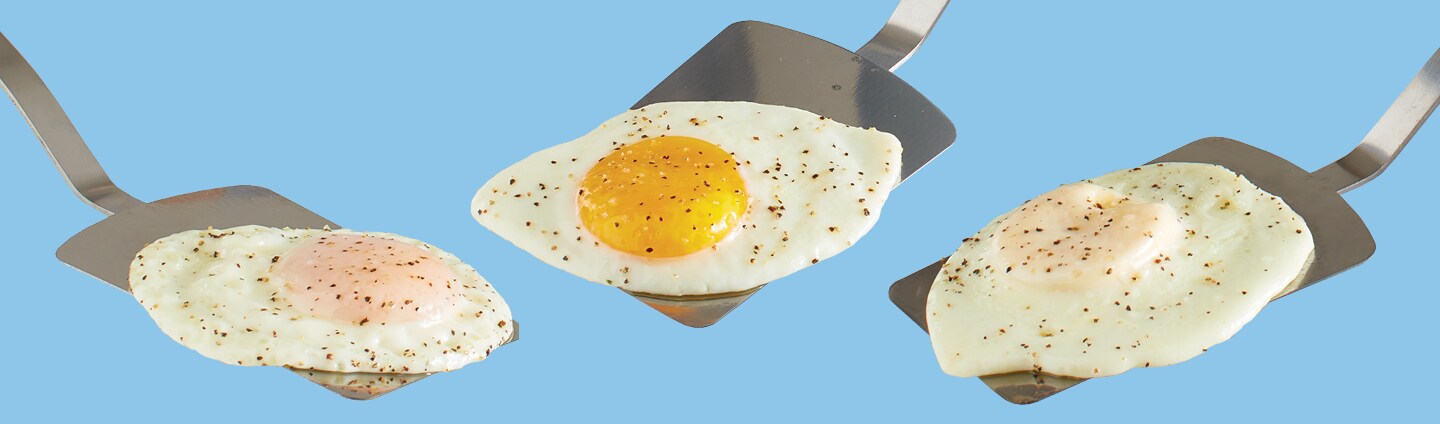 3 different styles of fried eggs each on spatula