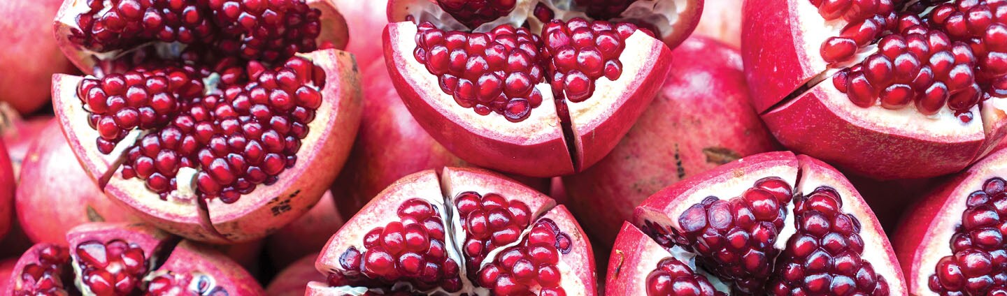 closeup of halved pomegranates
