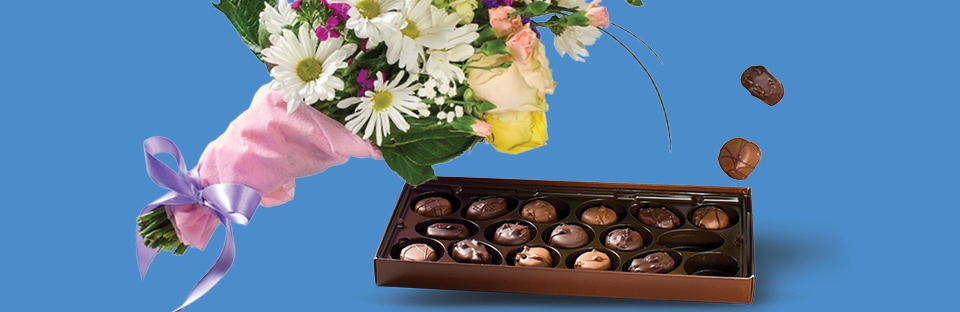 Bouquet of flowers and box of assorted chocolates